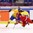 MALMO, SWEDEN - APRIL 1: Russia's Lyudmila Belyakova #10 gets tripped up by Sweden's Lina Wester #13 during quarterfinal round action at the 2015 IIHF Ice Hockey Women's World Championship. (Photo by Andre Ringuette/HHOF-IIHF Images)

